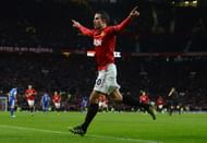 Robin van Persie of Manchester United celebrates scoring his team's second goal during the Barclays Premier League match between Manchester United and Everton at Old Trafford on February 10, 2013 in Manchester, England. (Photo by Shaun Botterill/Getty Images)